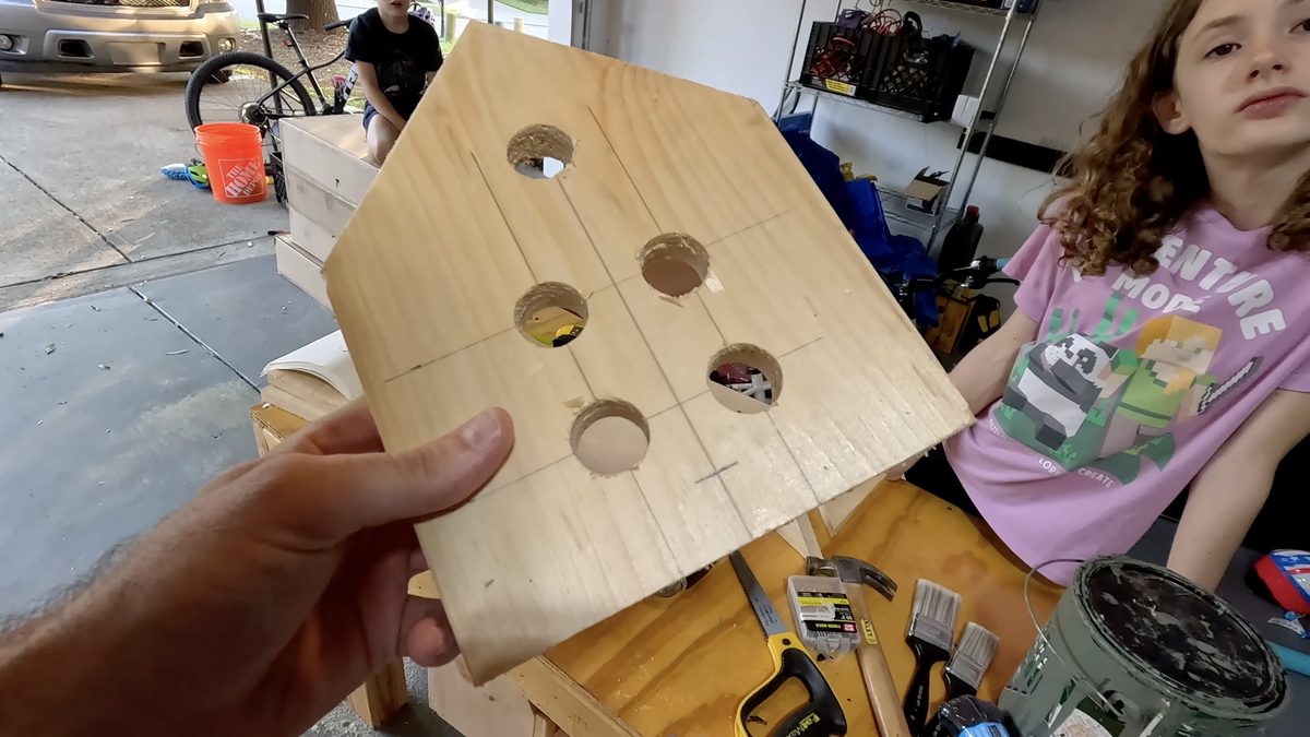 Drill holes in bird house front