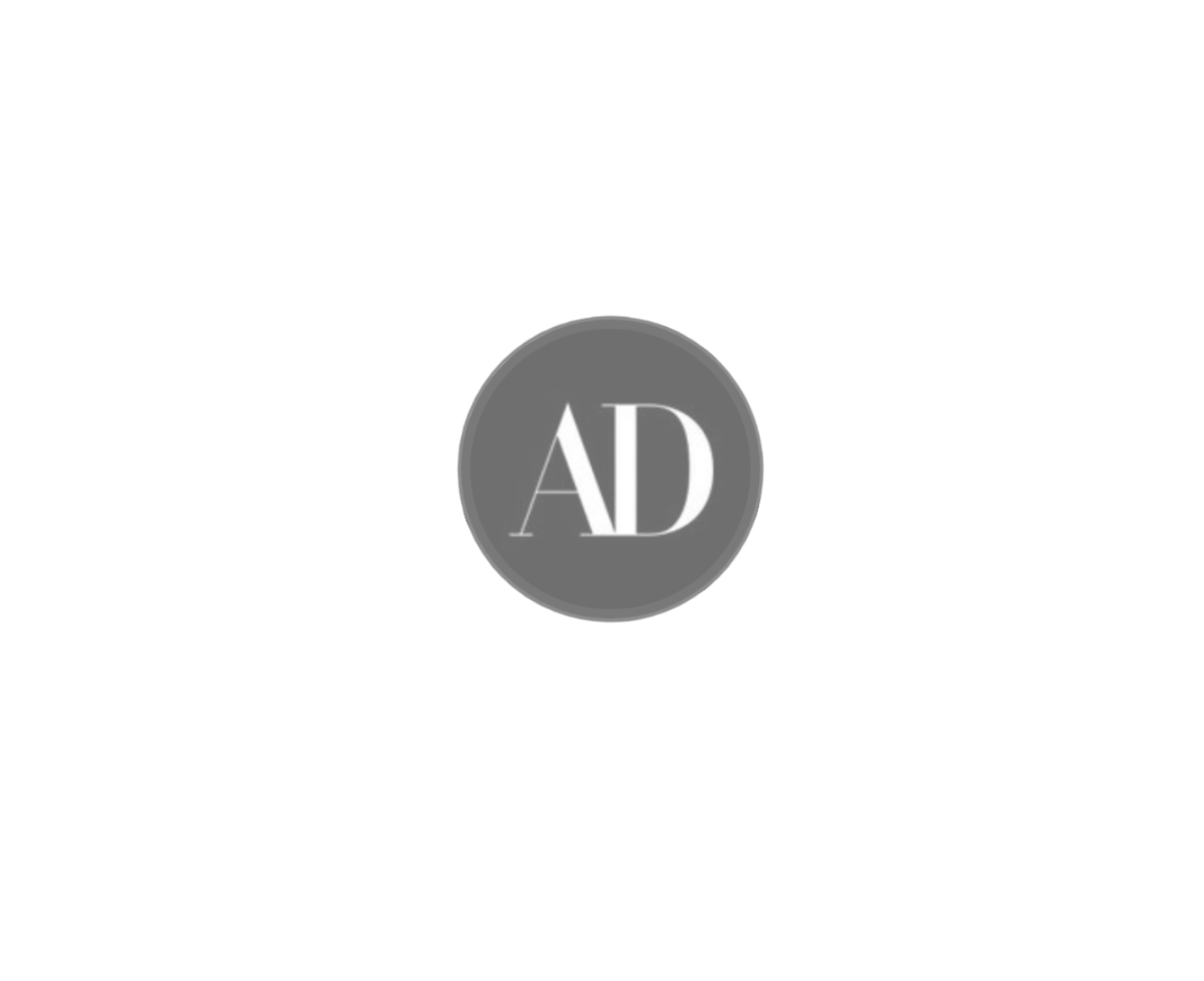 AD logo in white letters inside a dark gray circle.