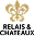 Gold fleur-de-lis symbol.