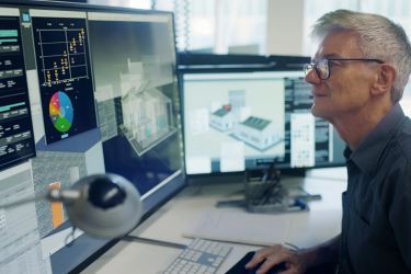 Man modeling a construction project in the computer