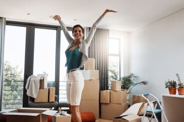 Woman decluttering while imagining some home upgrades