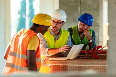 Person talking to construction clients