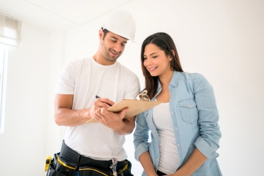 Contractor talking to the client