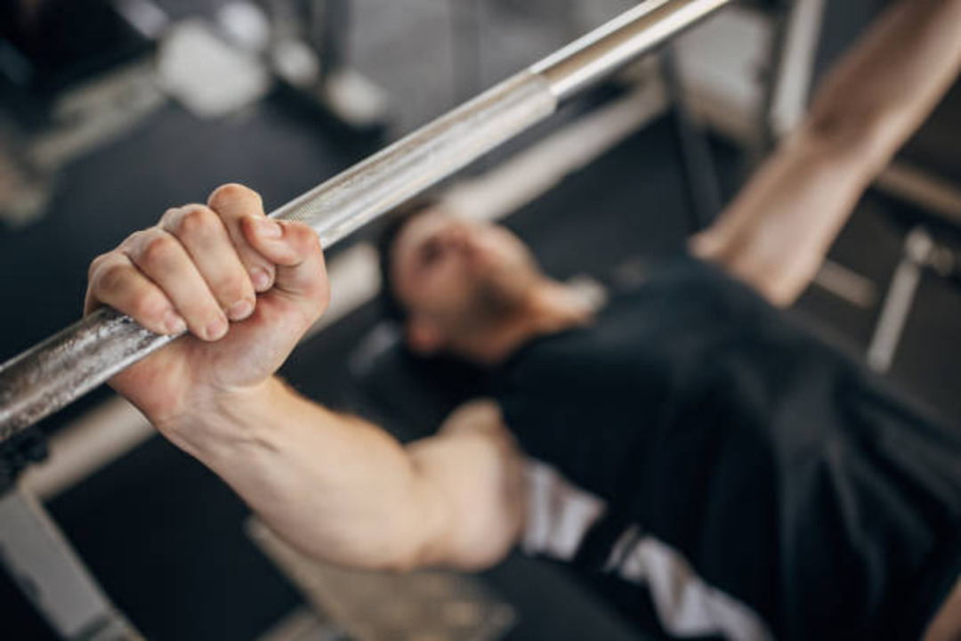 man working out - How Much Can The Average Man Bench Press