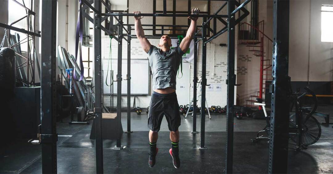 man working out -  Do Pull Ups Work Chest