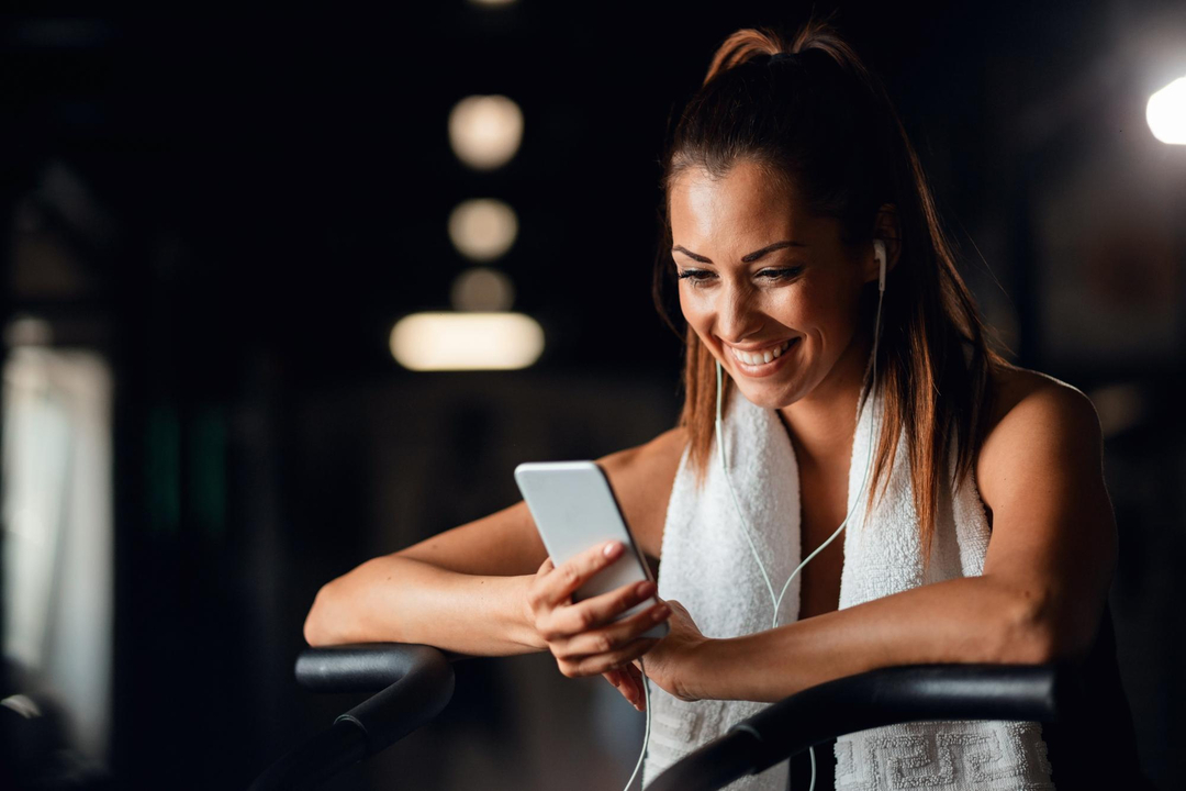 woman smiling - Free Workout Apps For Women