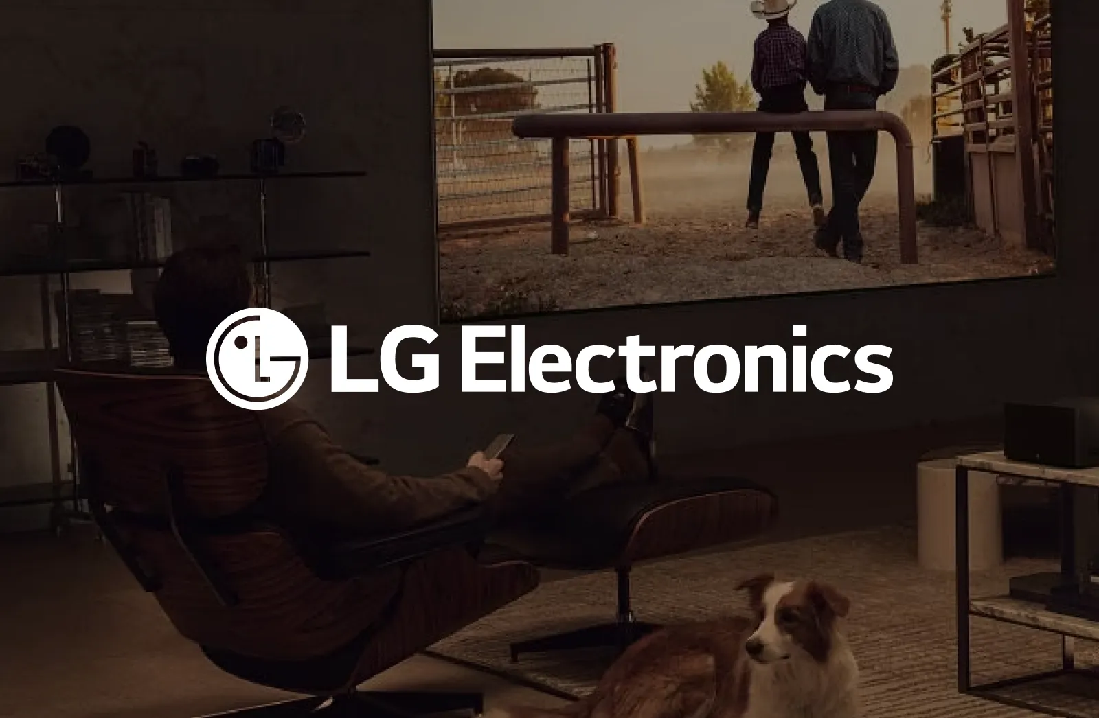 LG Logo over a photo of someone watching an LG tv.