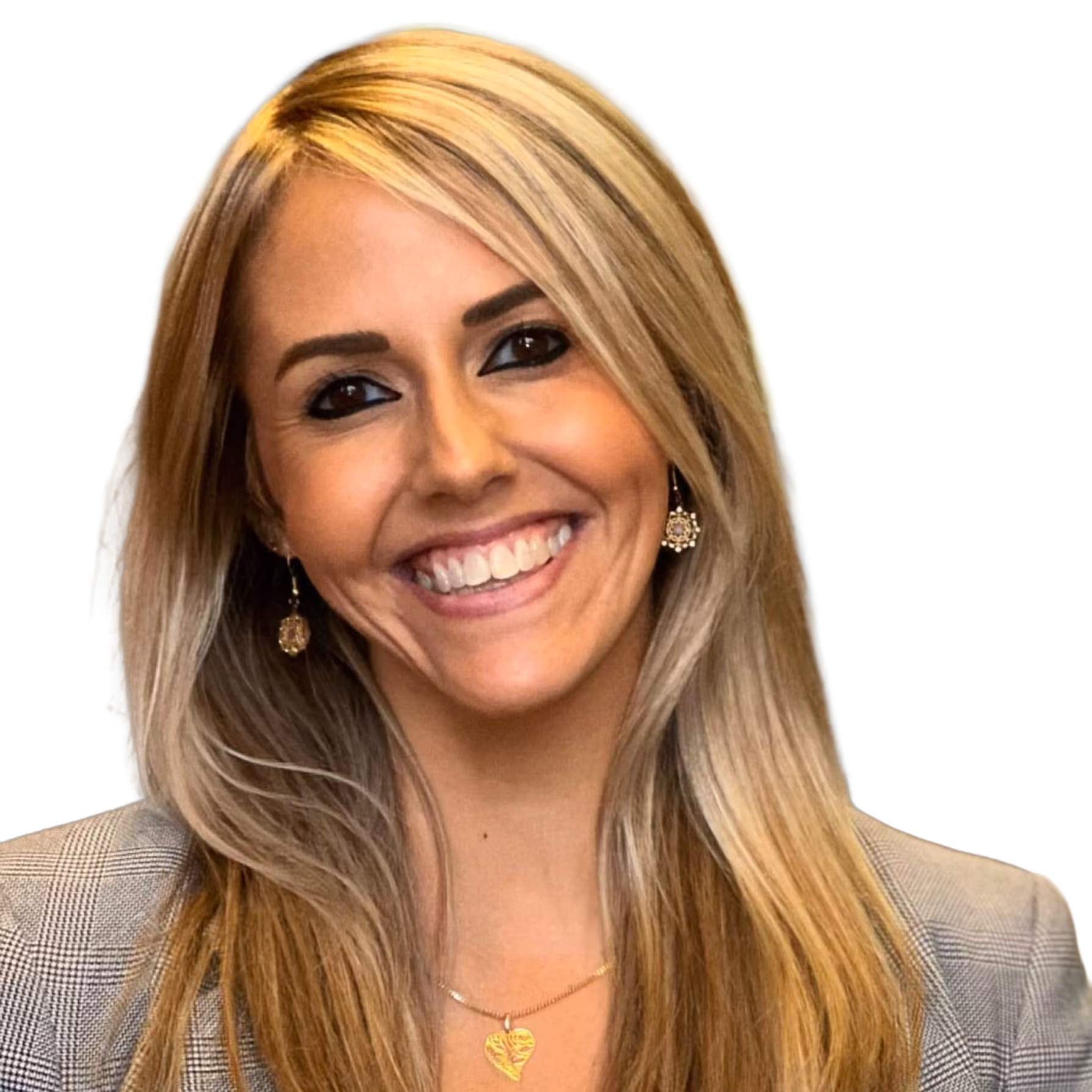 Smiling woman with long blonde hair wearing gold earrings, heart necklace, and a checkered blazer.