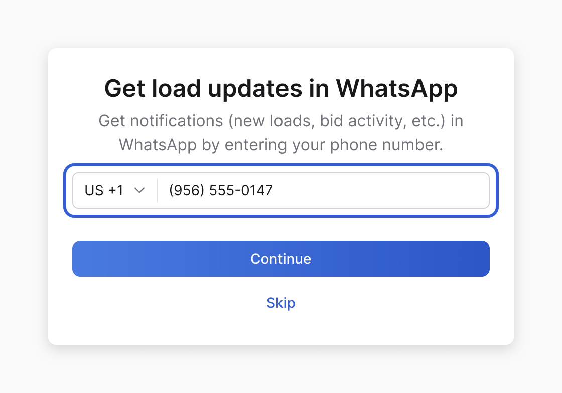The "Get load updates in WhatsApp" prompt with the phone number field outlined in blue, a Continue button and a Skip link.