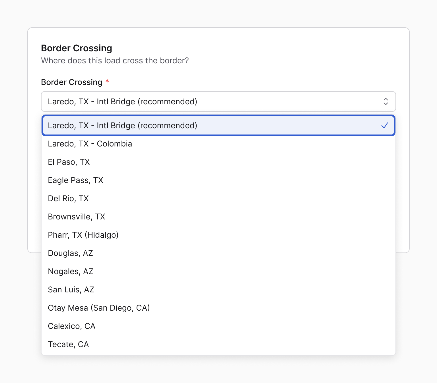 The Border Crossing list open on a Monterrey, NLE to Laredo, TX load. "Laredo, TX - Intl Bridge (recommended)" is first, selected and outlined in blue, above Laredo, TX - Colombia, El Paso, TX and the other crossings.