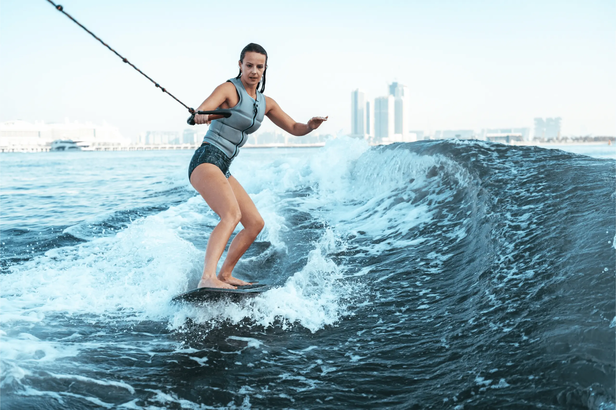 woman wake surfing ocean