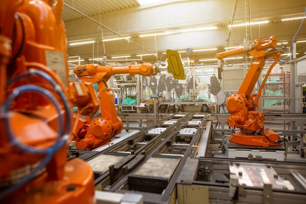 Automatic robots in the industrial factory for assembly automotive products, automotive concept