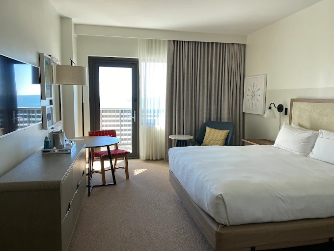 Rooms and Suites: Lakeside Luxury with Coastal Whispers