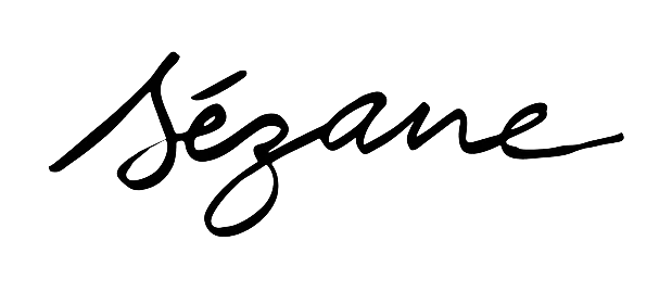 Handwritten black script text reading 'Sézane' on a transparent background.