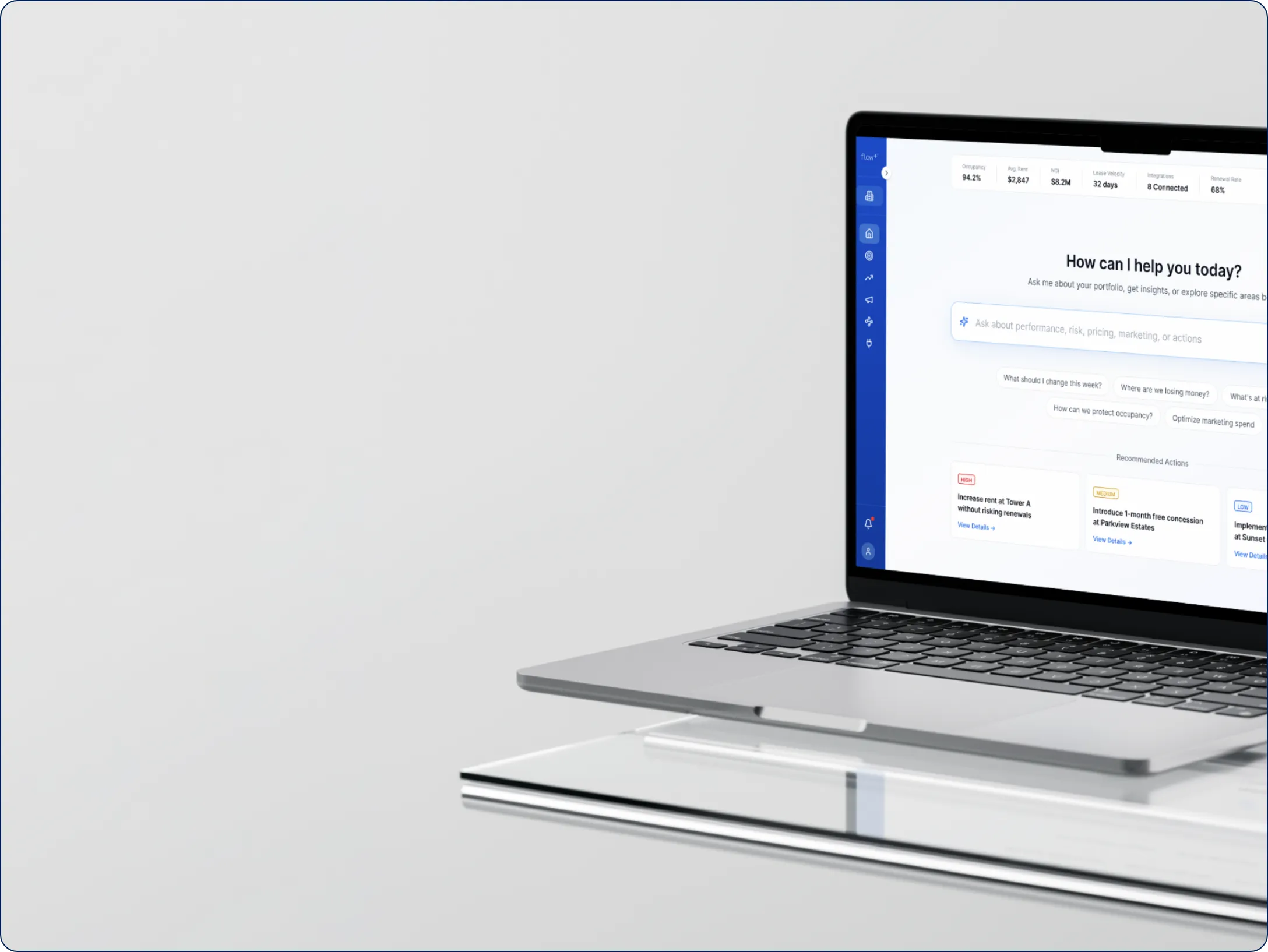 Laptop displaying a dashboard with portfolio insights, showing occupancy, average rent, NOI, lease velocity, integrations, and renewal rate.