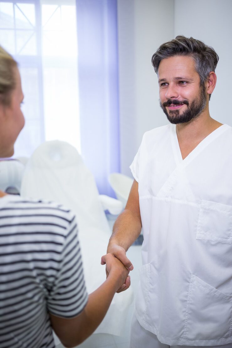 Provider greeting a patient at the AmpUp Wellness clinic in Delray Beach