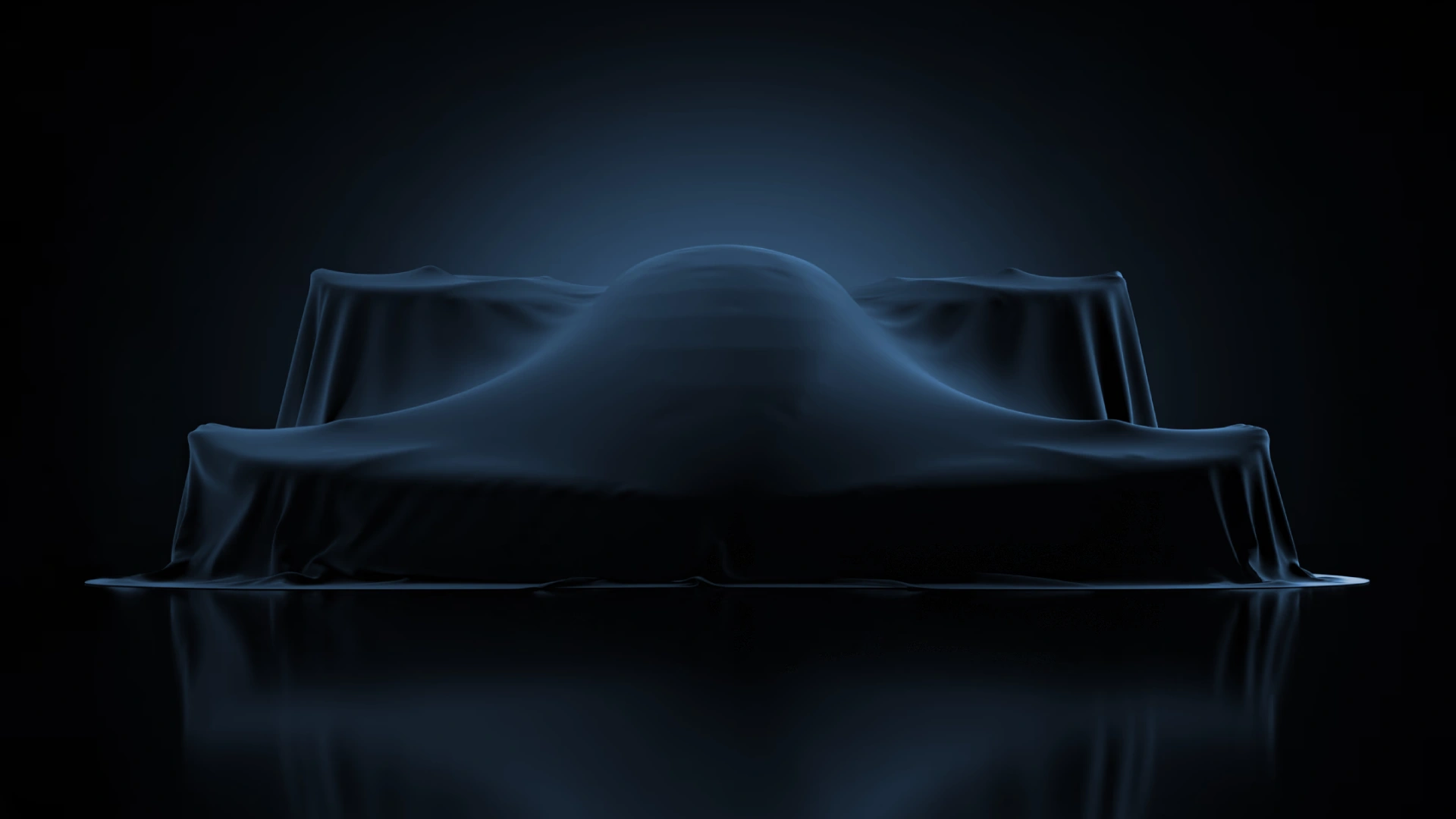 Crowd at a Doroni launch event facing a covered aircraft on stage, with spotlights and cameras illuminating the scene.