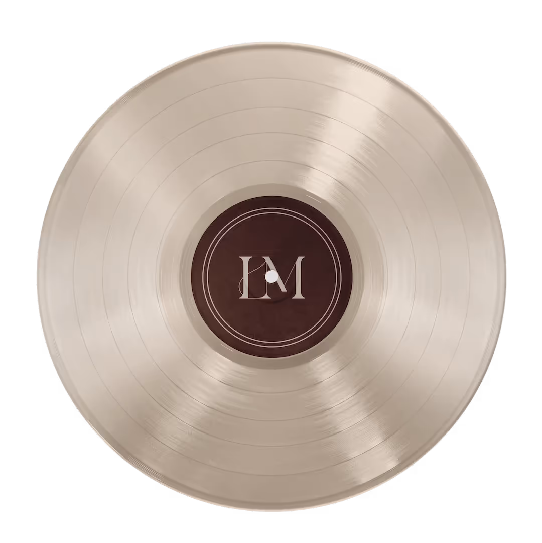 Silver vinyl record with a dark center label displaying stylized 'LM' letters.