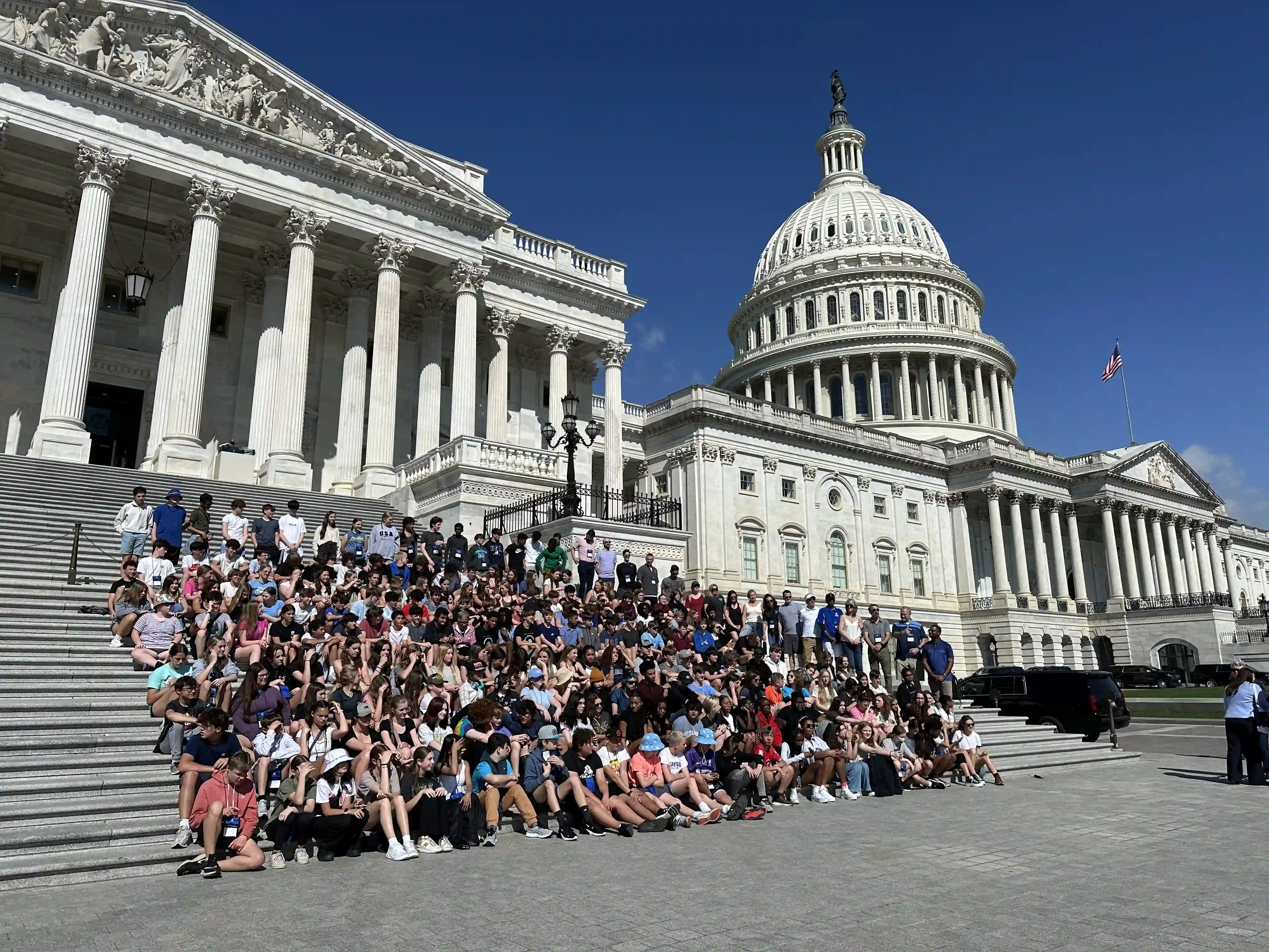 Stunning coastal village of Riomaggiore in Cinque Terre, Italy, with brightly colored buildings cascading down the hillside towards the sea