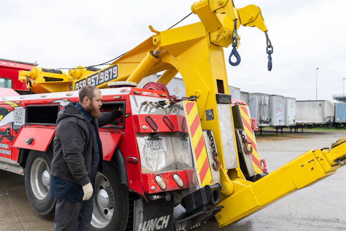 Diesel mechanic performing roadside assistance in Greendale, IN