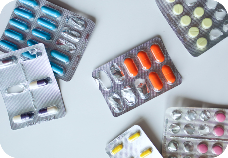 Blister packs of assorted prescription tablets and capsules