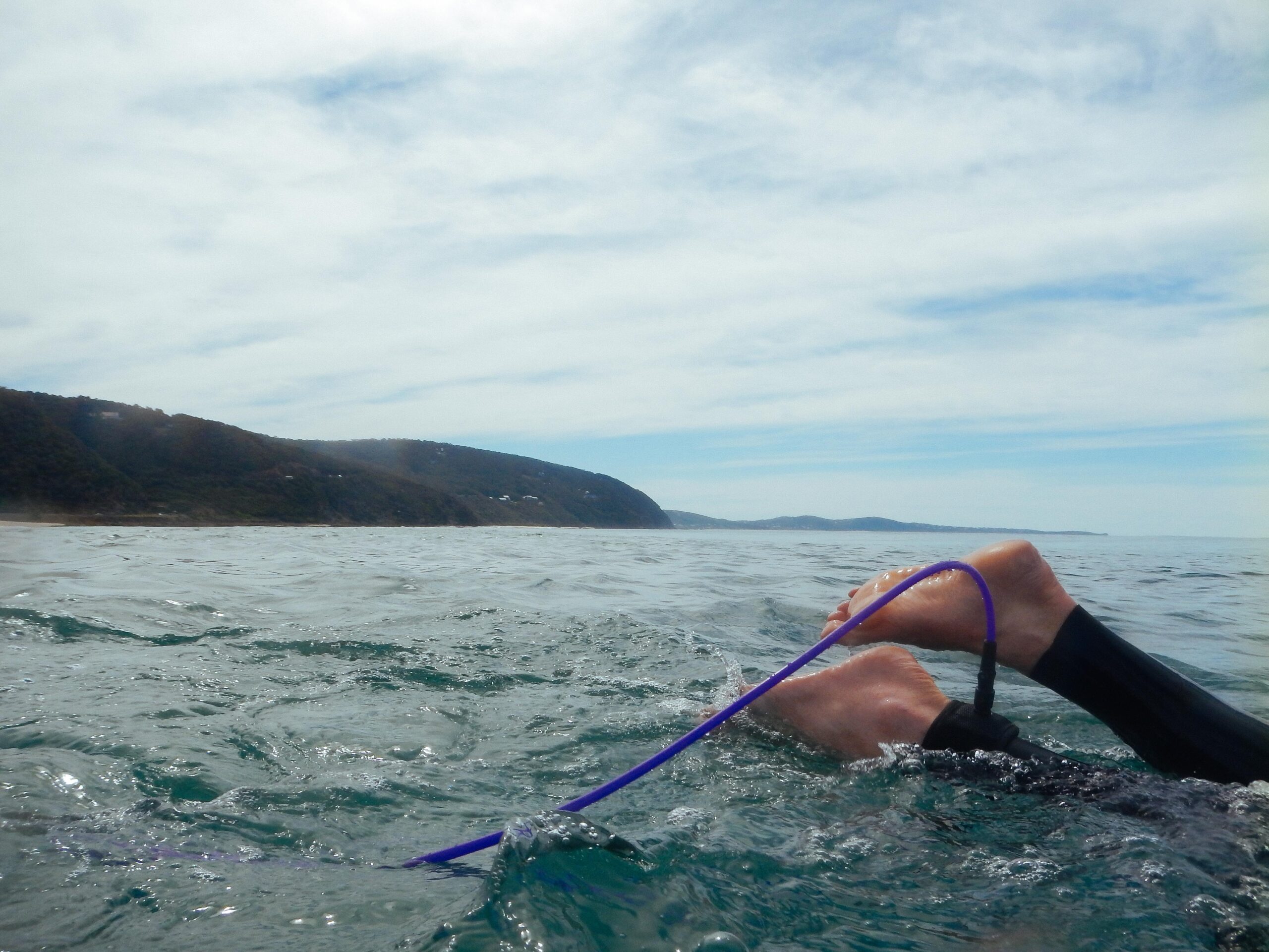Open-water swimmer in a cold sea