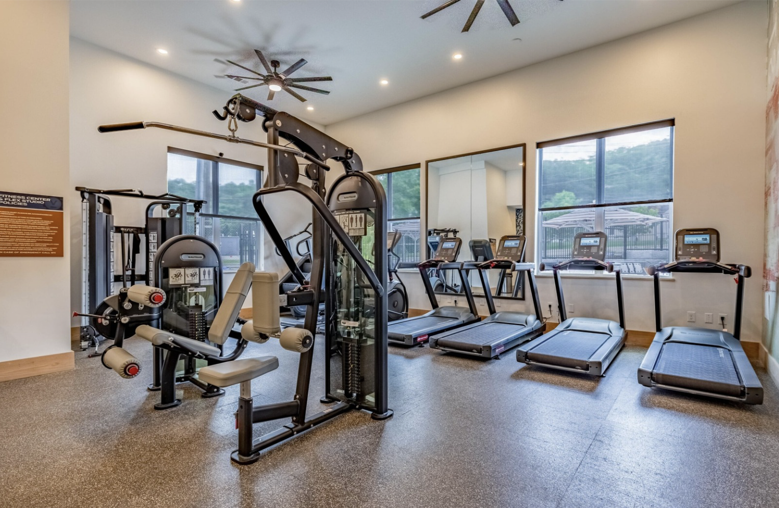 Fitness Center with workout equipment and machines