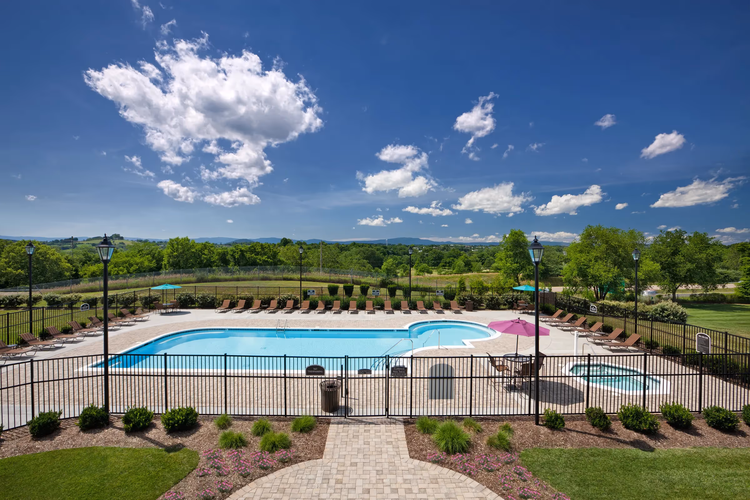 pool with lounge chairs