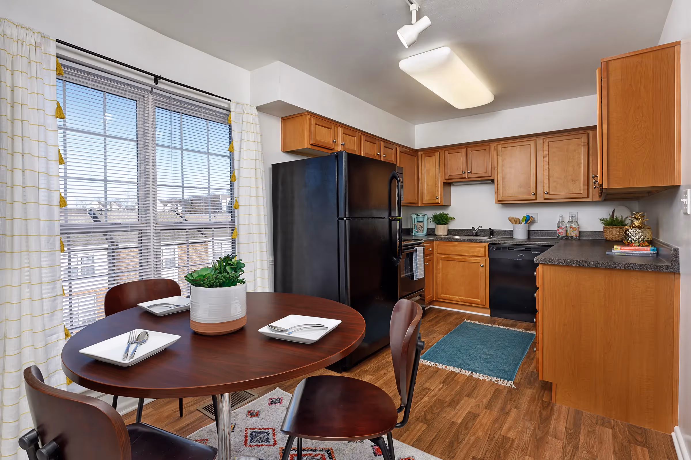 dining room with table and chairs and view of kitchen