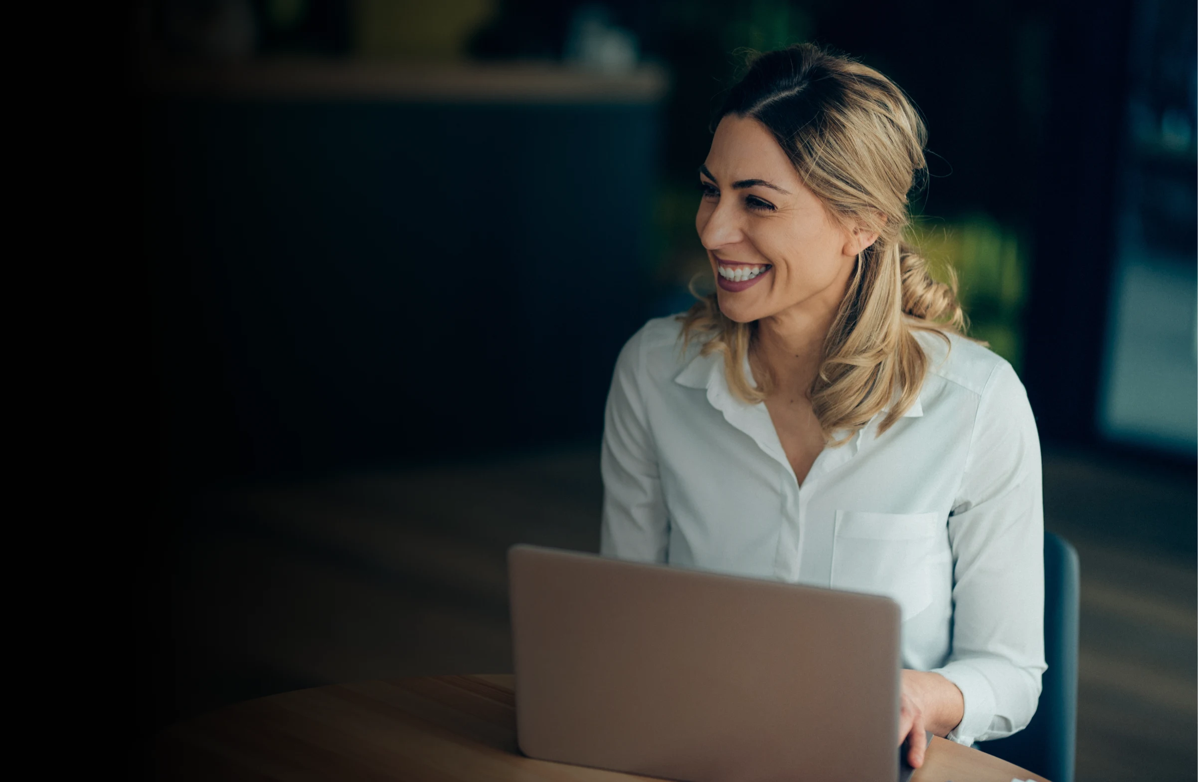 Smiling woman startup founder representing confidence and success using DataVue.