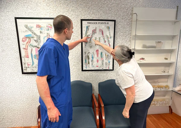 Dr. Armellino working with a patient