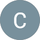 White letter C centered inside a blue-gray circle.