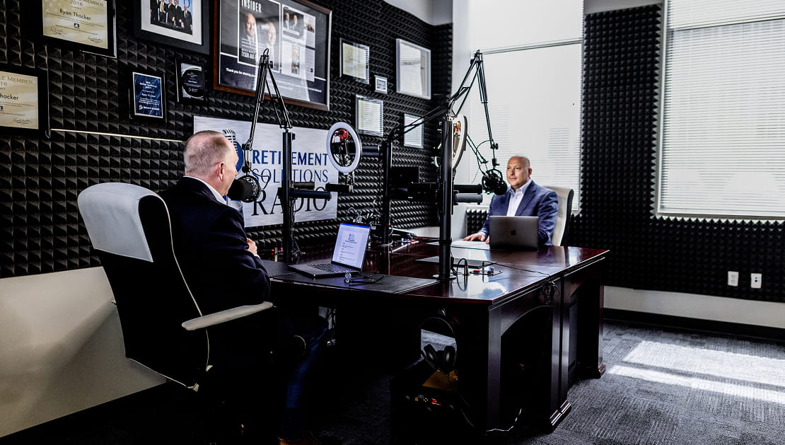 Ryan Thacker in the studio recording a "Retirement Solutions: The Podcast" episode