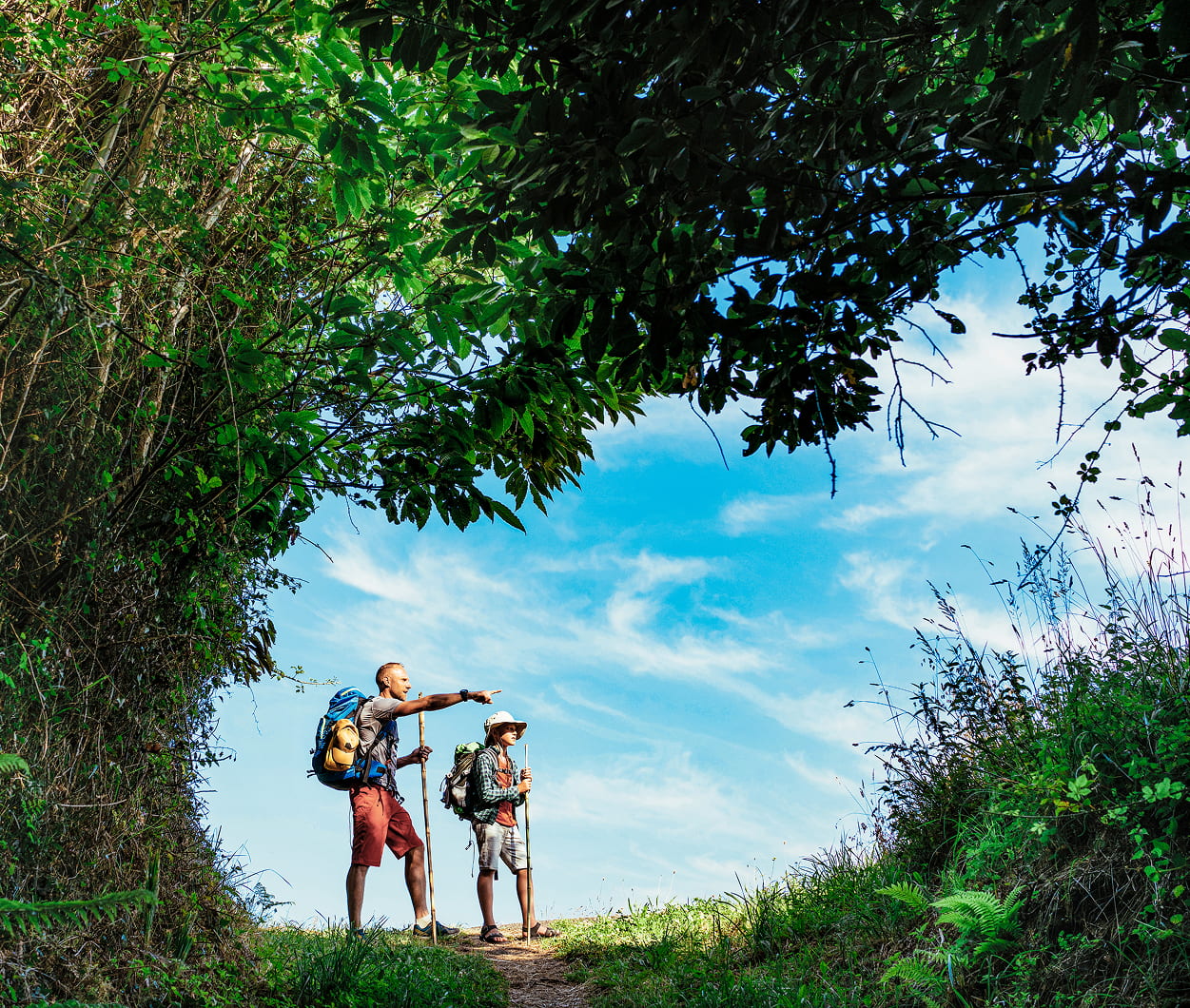 Retiree hiking with grandson