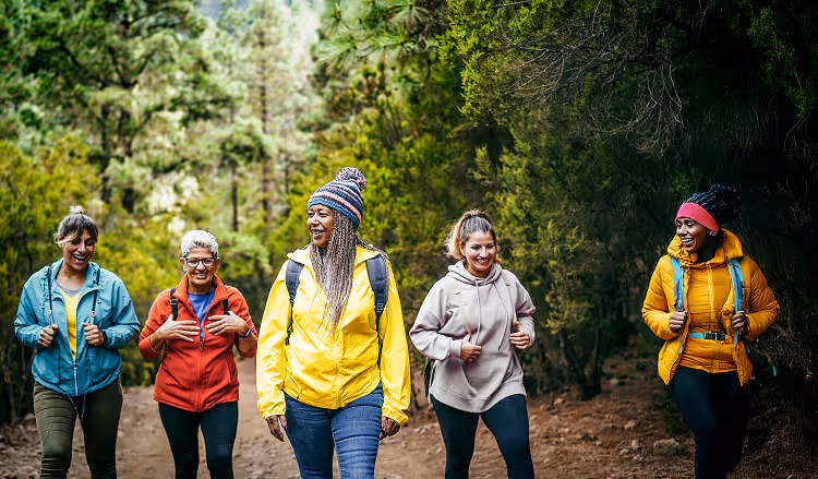 Retirees on a hike through the forest