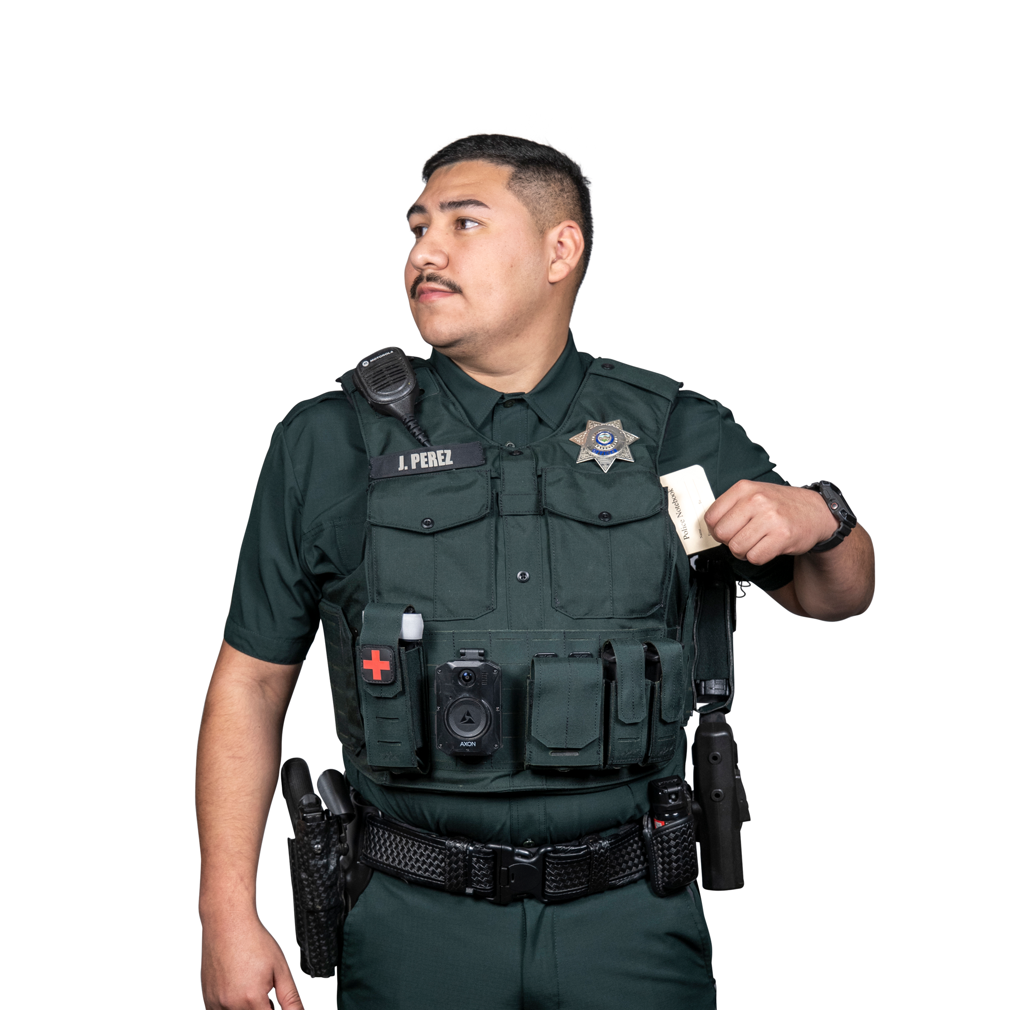 Police officer in uniform with name tag J. Perez holding a police notebook in his vest pocket.