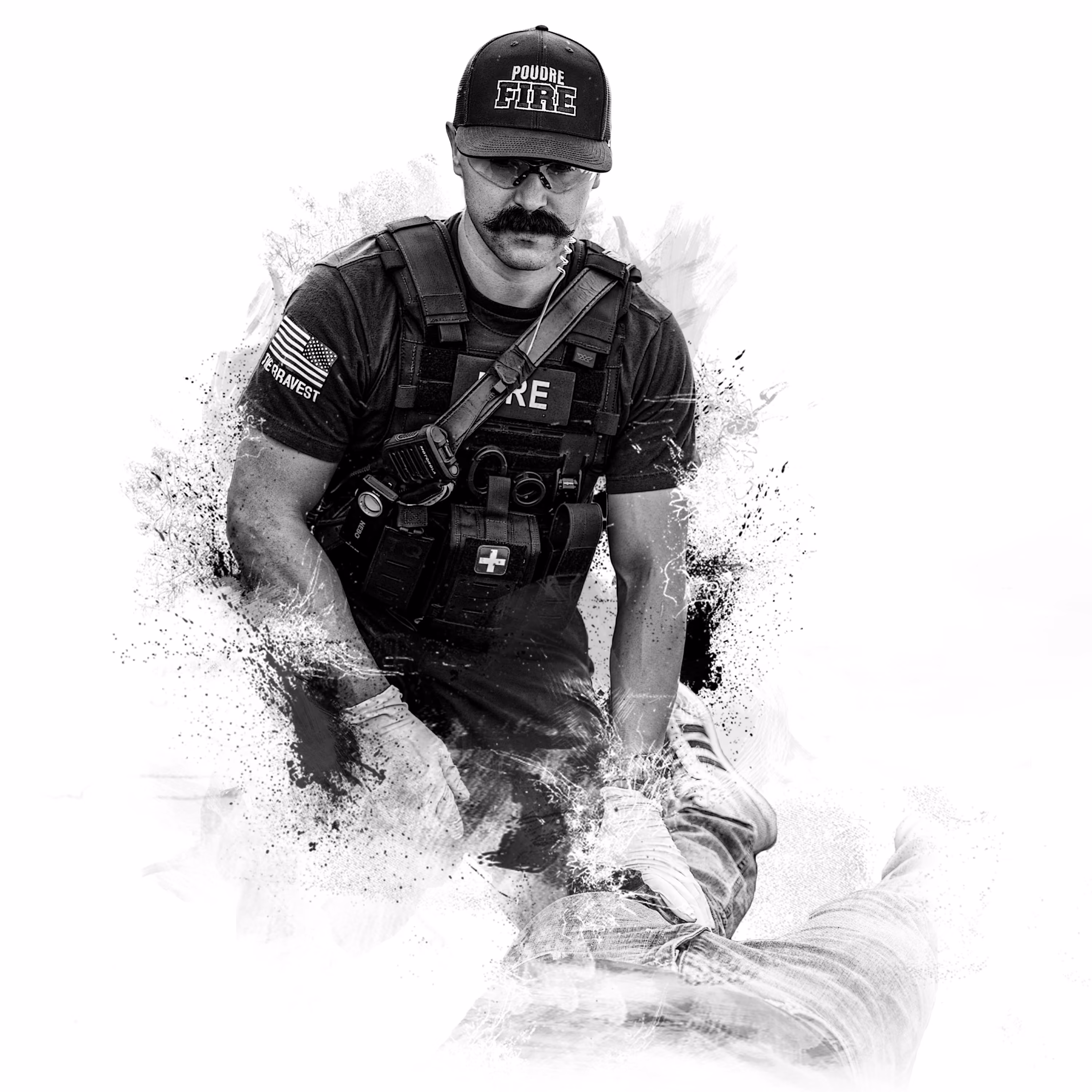 Firefighter in tactical gear assisting person lying down, black and white artistic effect.