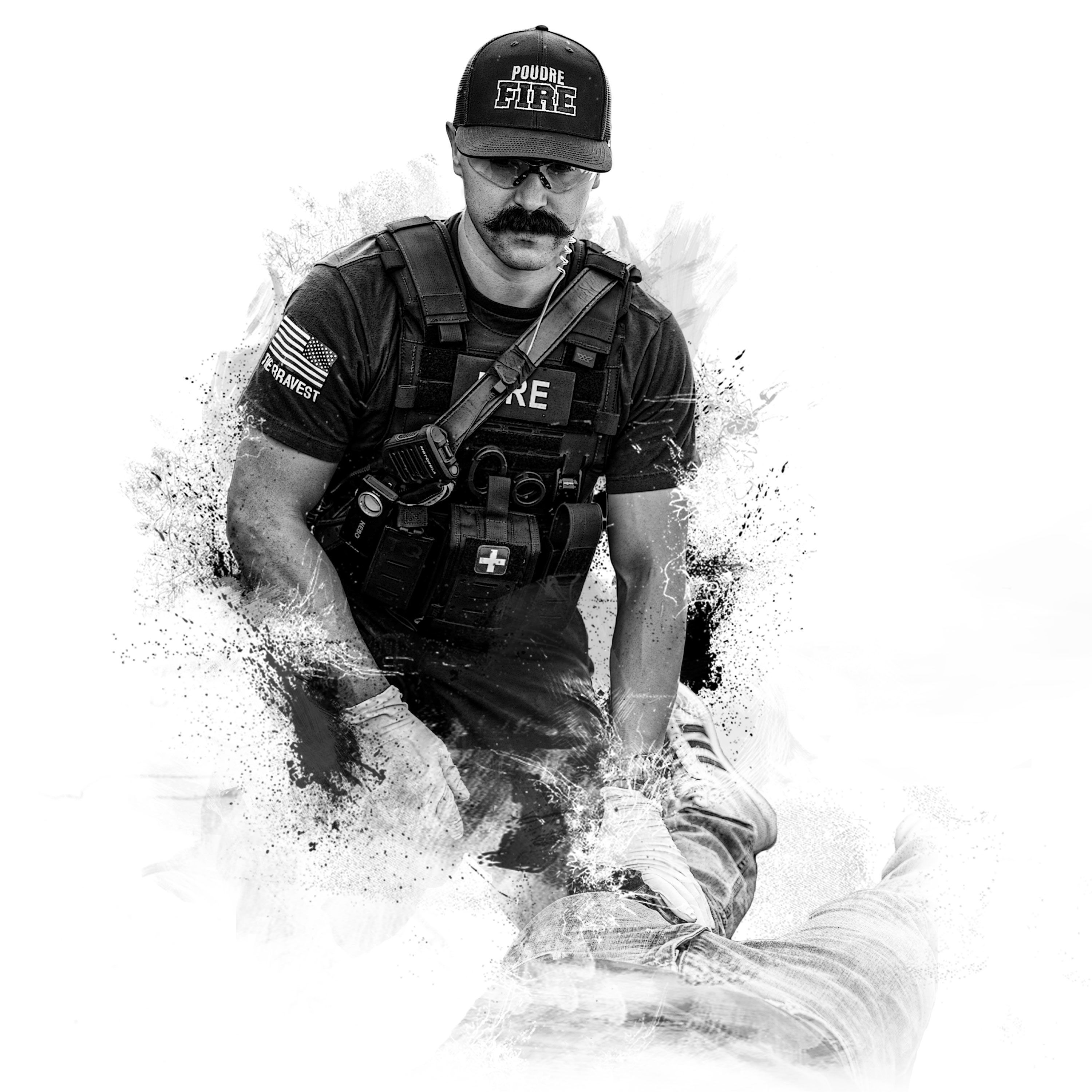 Firefighter in tactical gear assisting person lying down, black and white artistic effect.