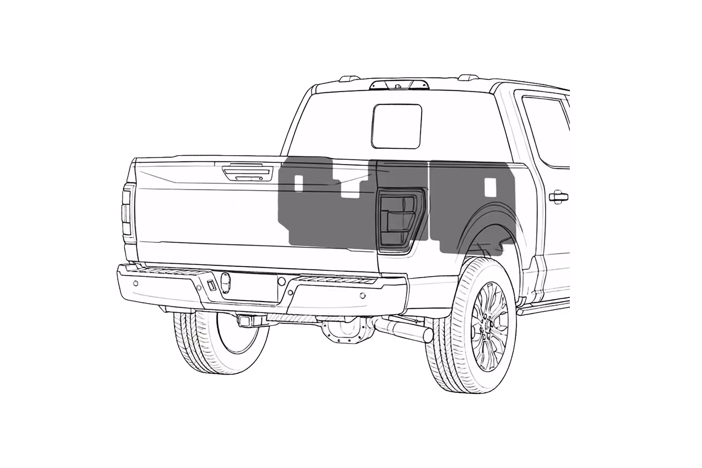 Rear and side view of a pickup truck with a shadow of a bulkhead on the bed area.