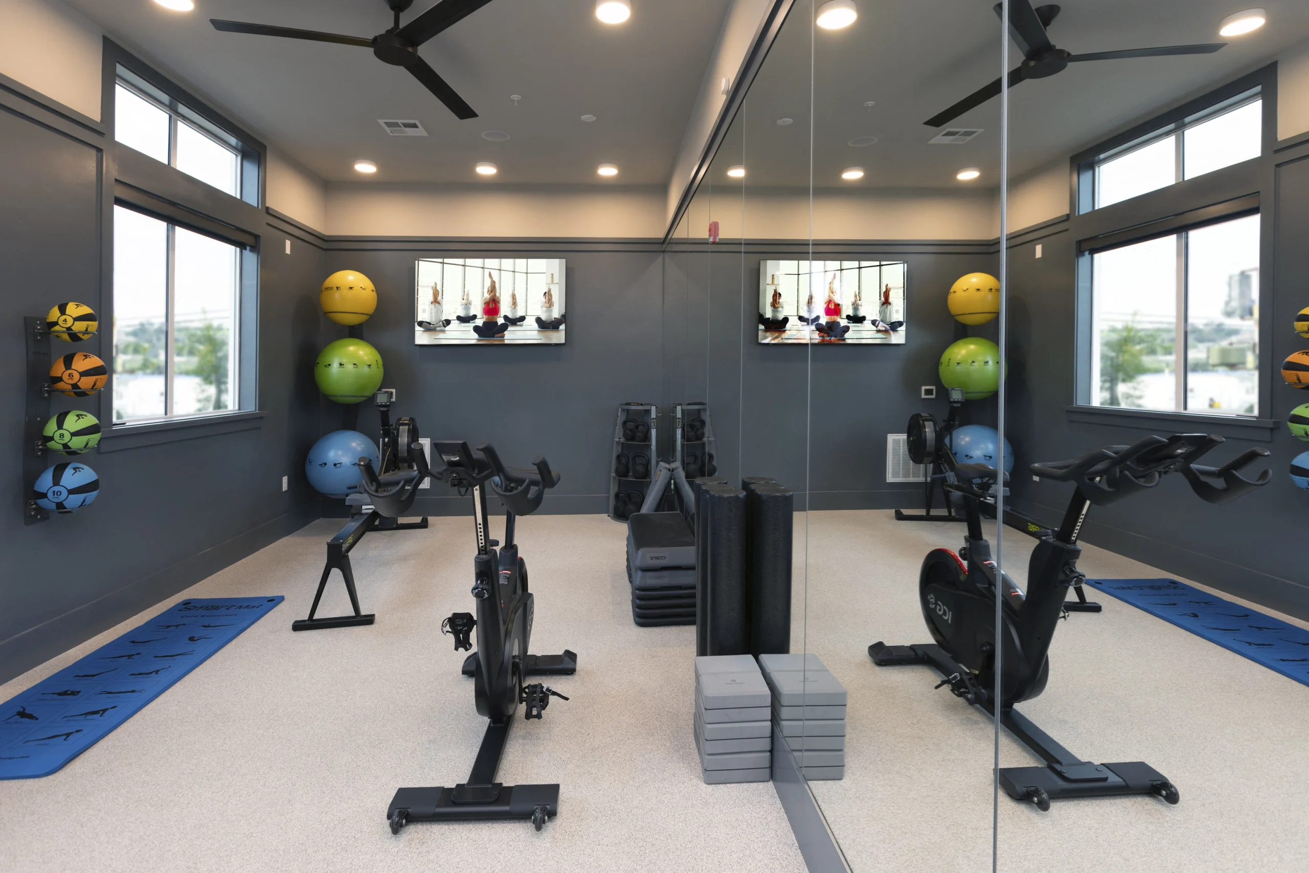  Fitness Center with cardio and strength equipment  l 1 & 2-Bedroom Homes 