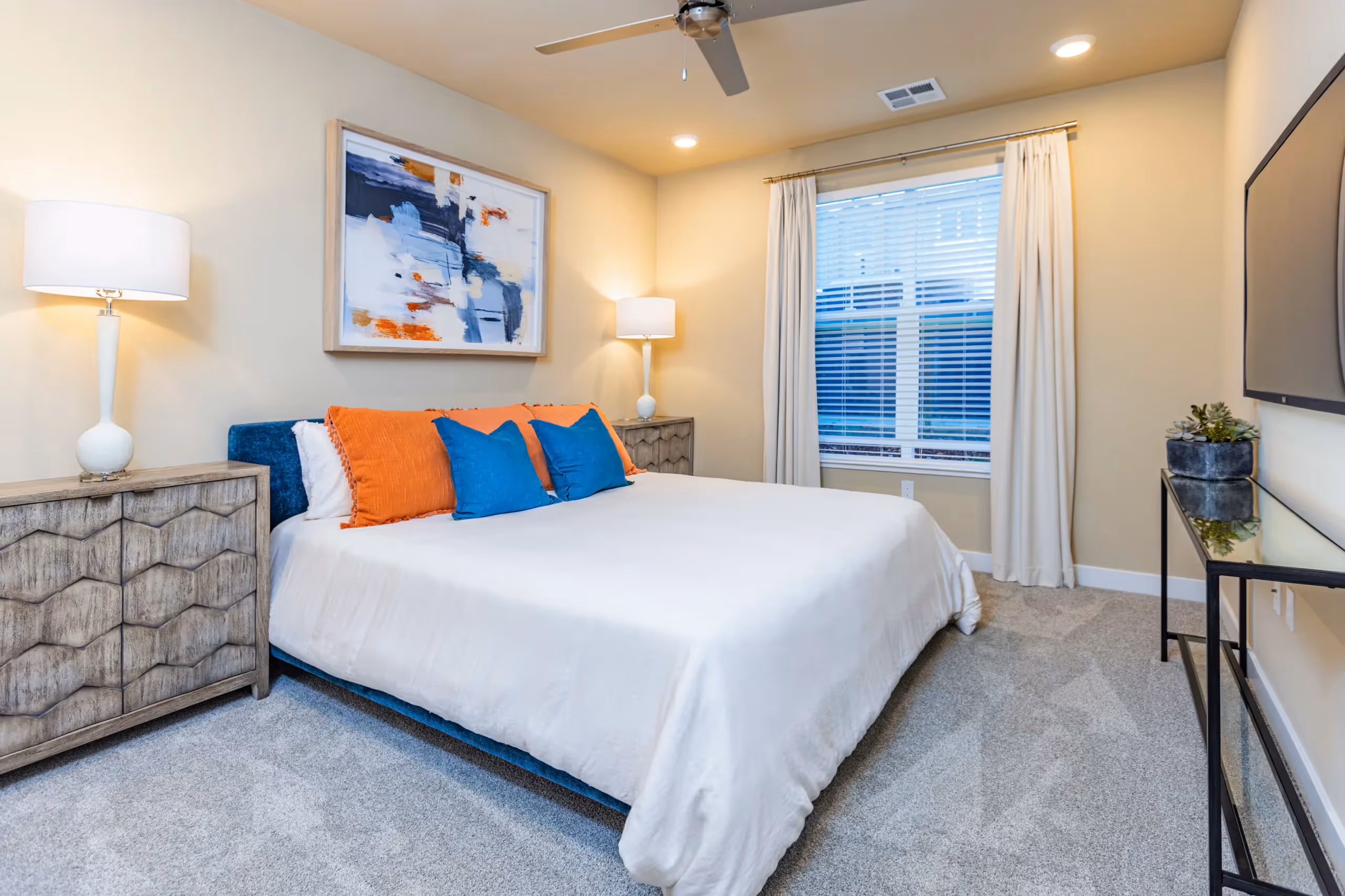 Bedroom with bed l 1 & 2-Bedroom Homes 