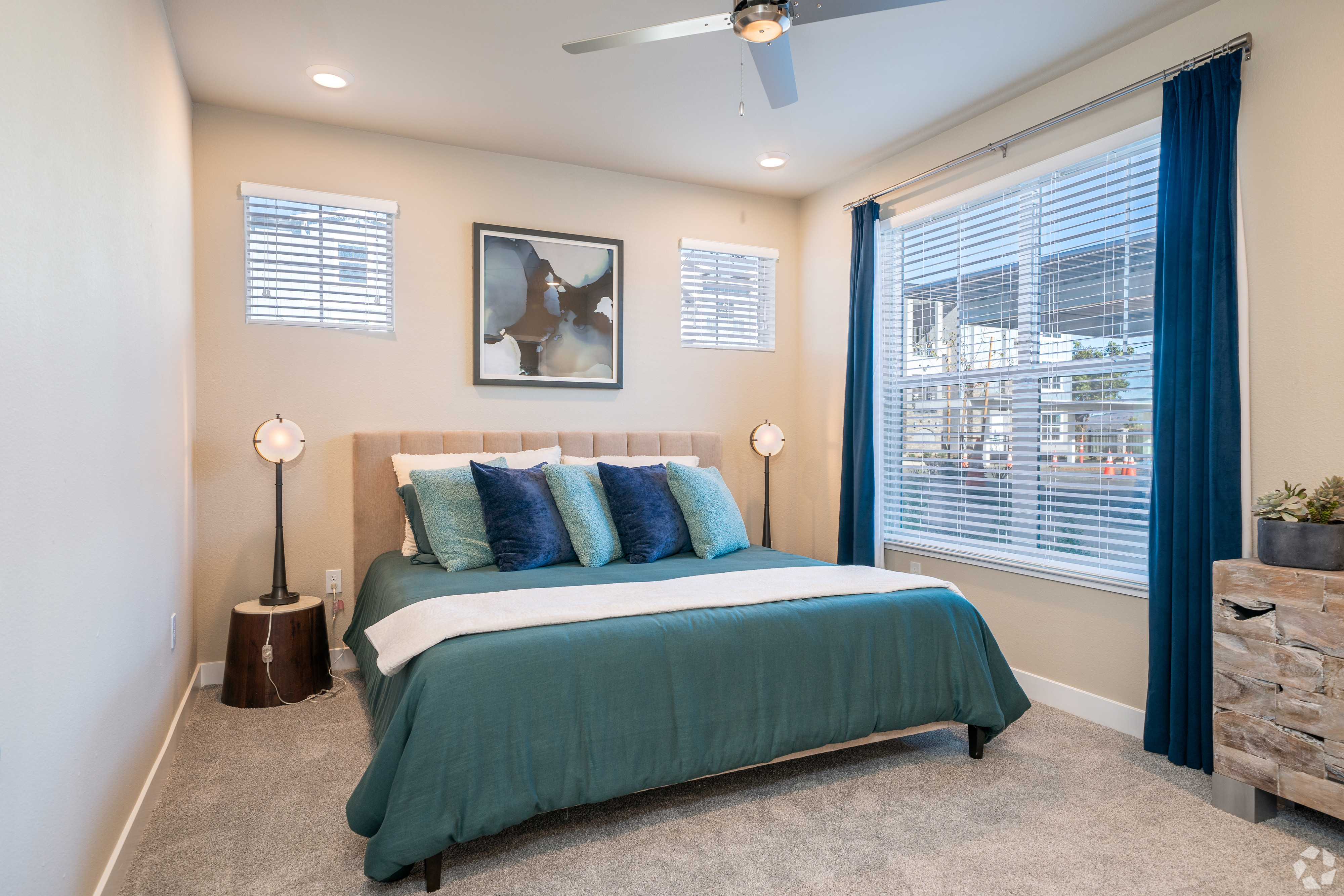 Bedroom with bed l 1 & 2-Bedroom Homes 