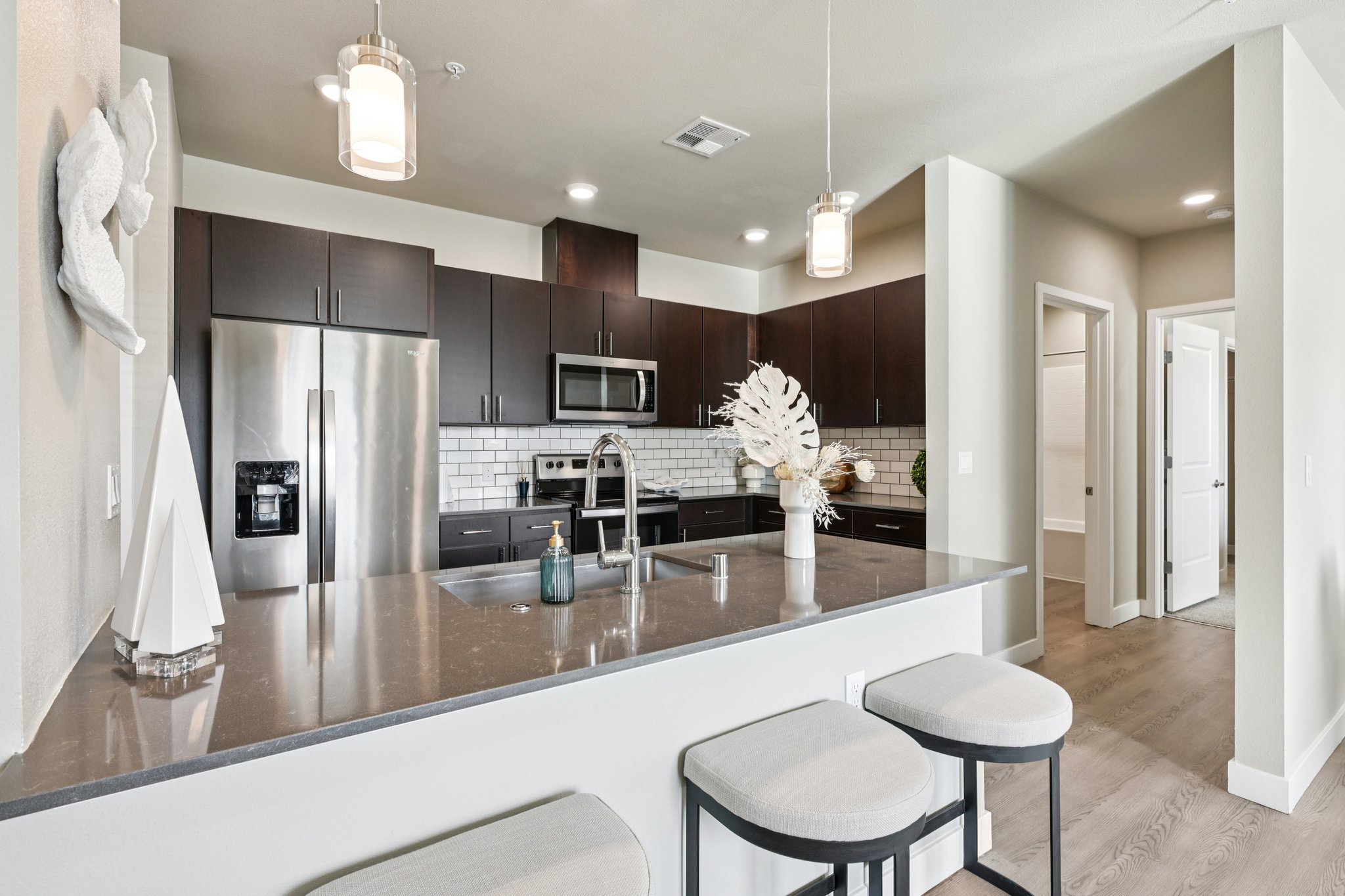 Luxury Kitchen with brown cabinets l Anchor 532 Apartments in Vallejo, CA