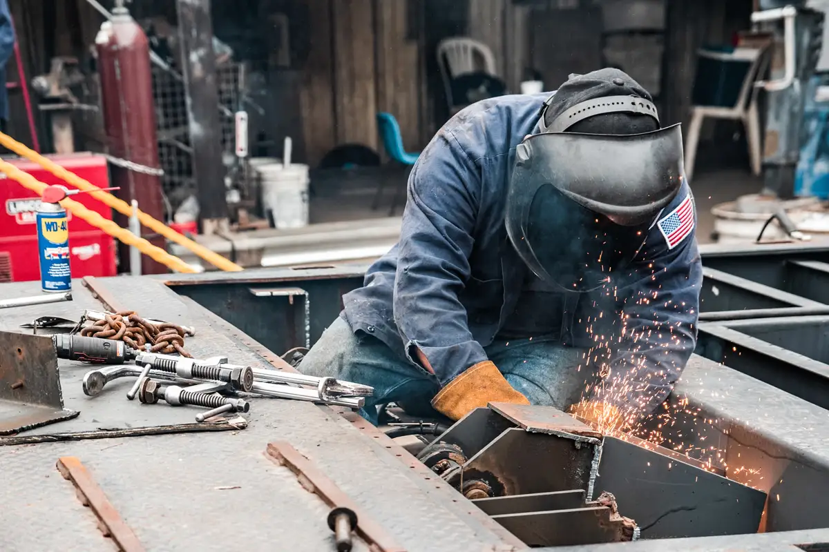 Mechanic performing welding services in Seminole, TX