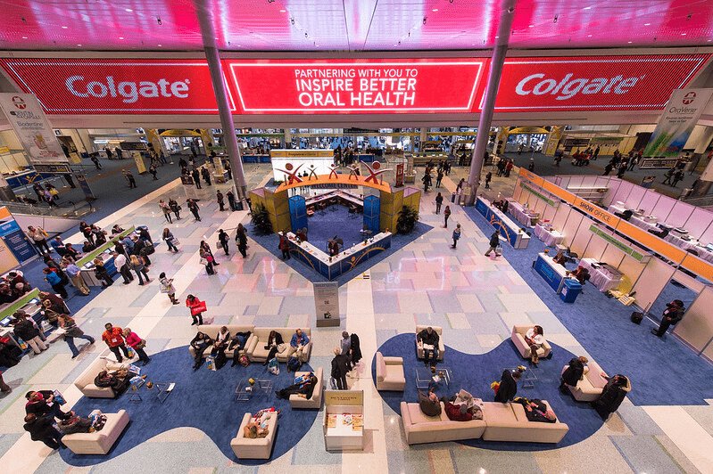 a giant video wall advertising Colgate
