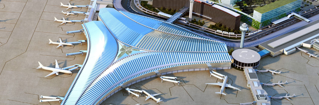 Aerial view of a modern airport terminal with airplanes parked at multiple gates and adjacent curved roads.