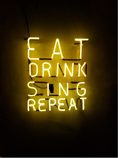 Neon yellow inscription on a black background