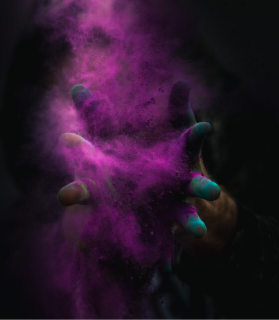 Hands in purple paint