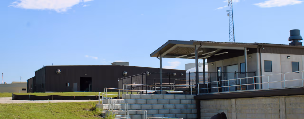 background image: river through a meadow
