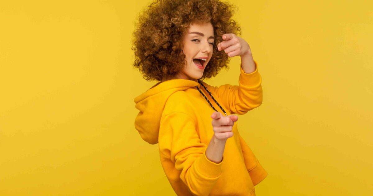 Girl pointing to the camera